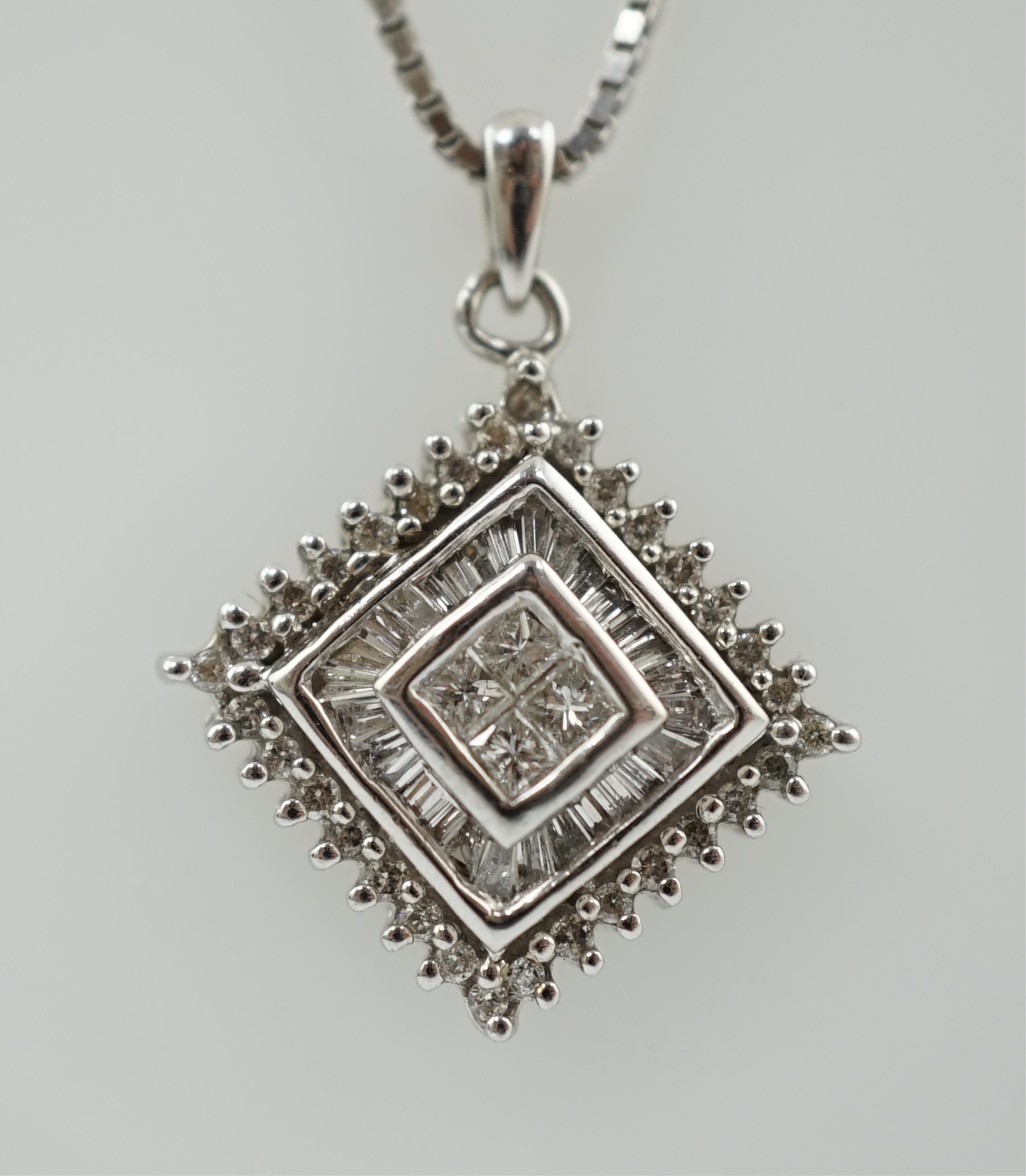 A modern 14k white gold and diamond cluster set pendant, on an Italian 18k white gold fine link chain